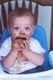He thoroughly enjoys Grandma Guy's molasses cookies! They're great for teething.